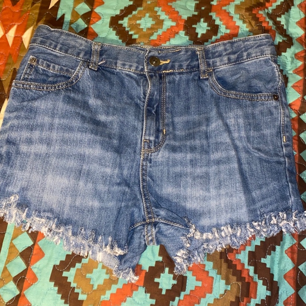 Boys jeans cut into shorts
